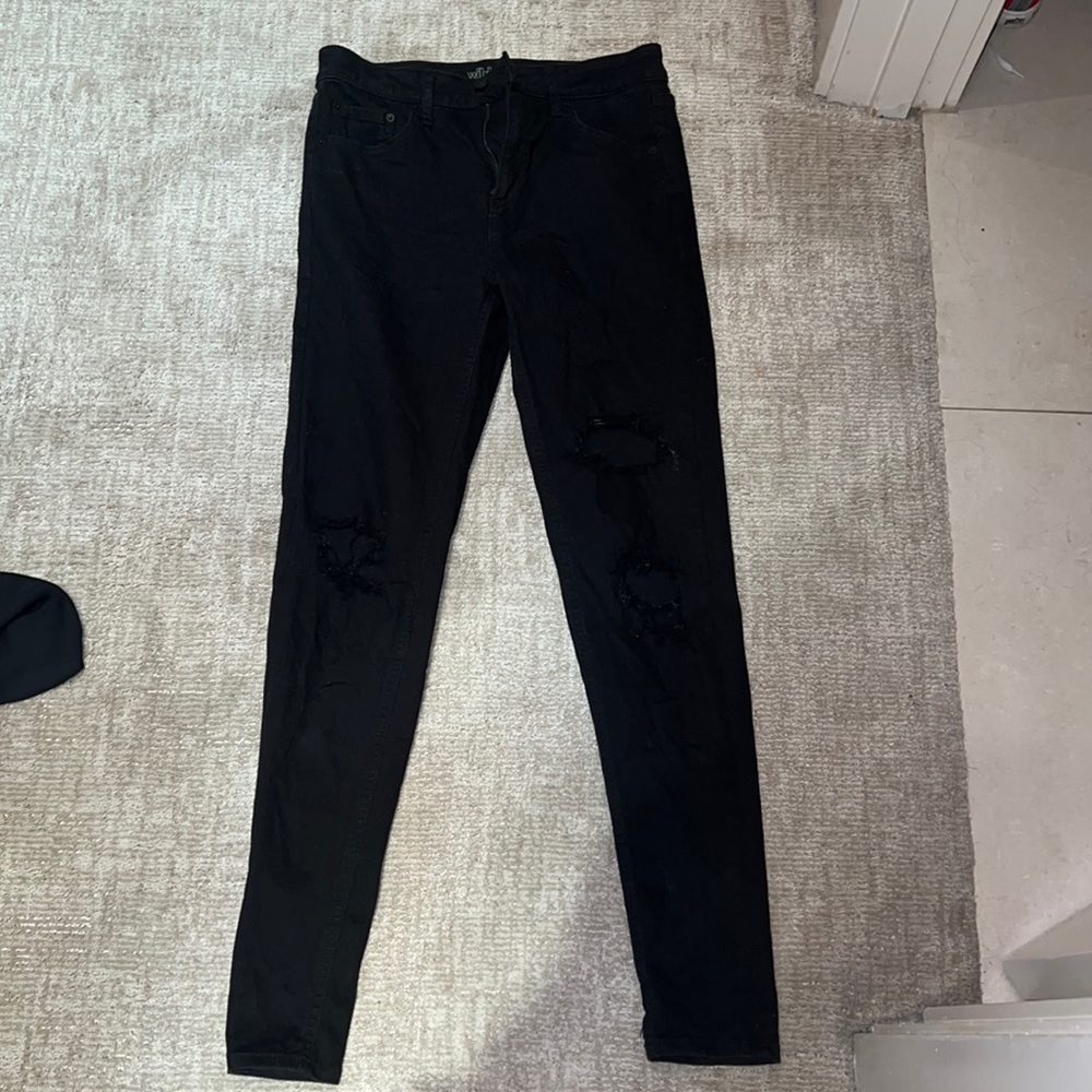 black ripped jeans